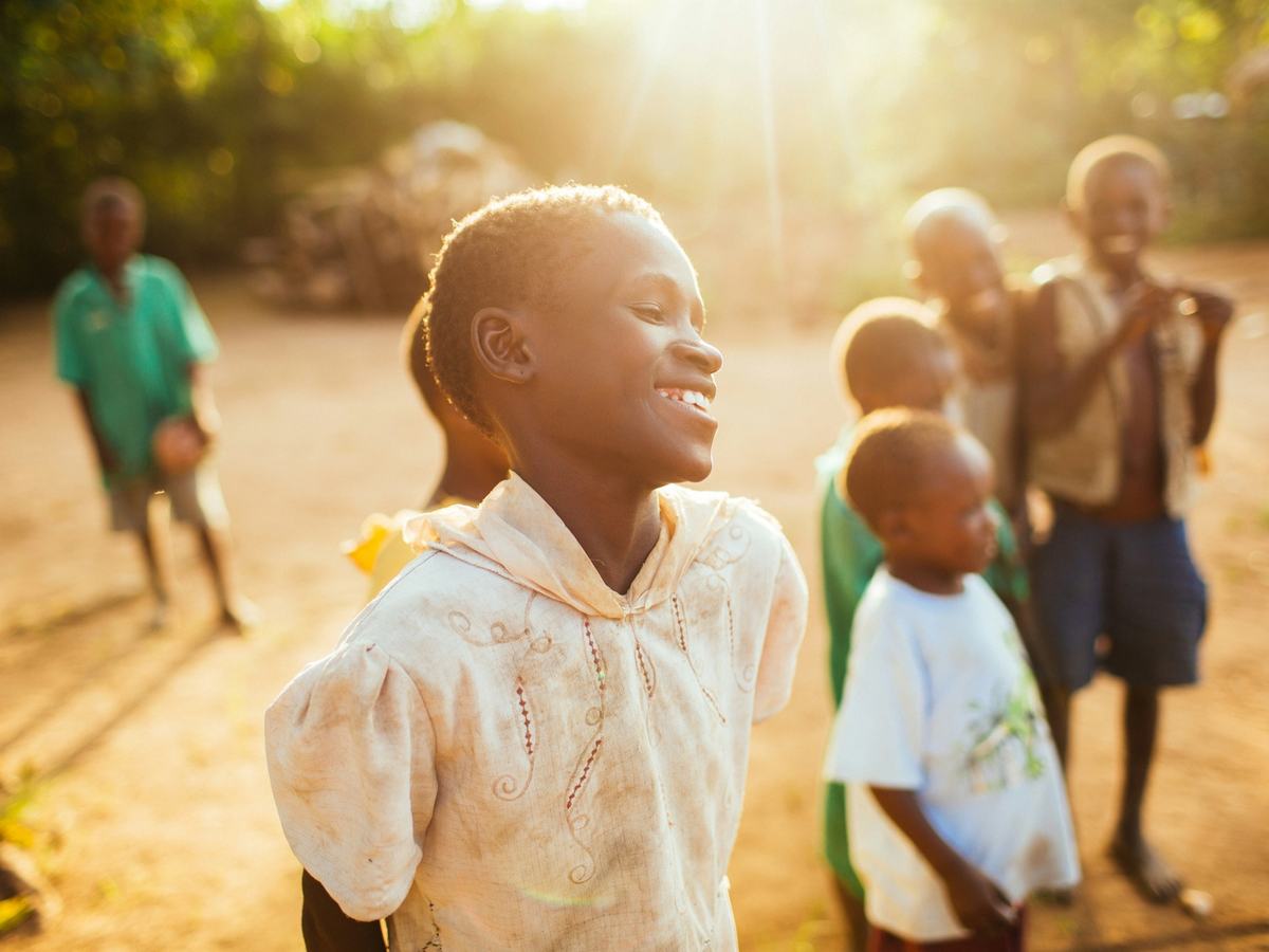 Children playing in warm evening light