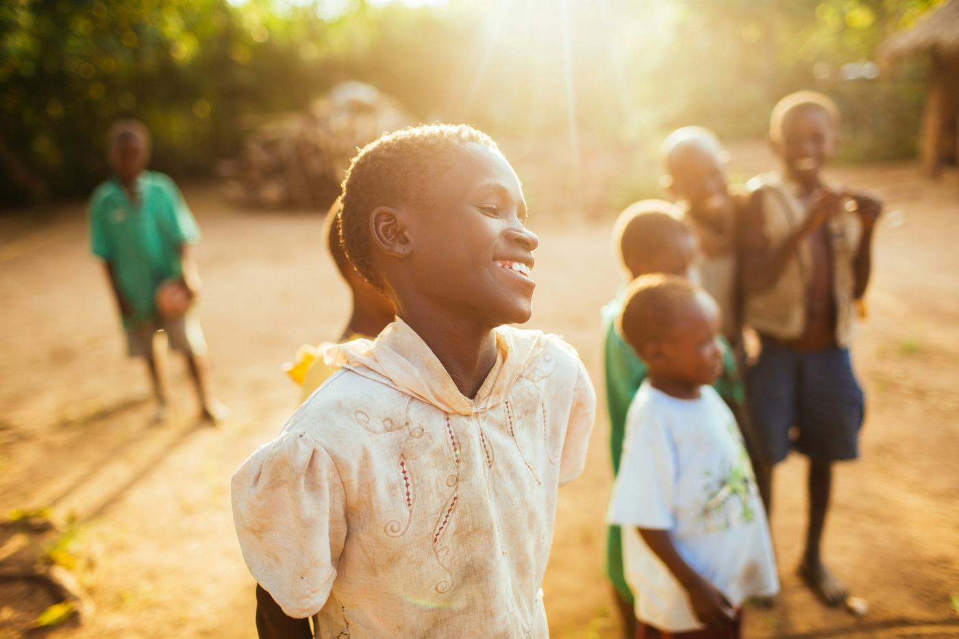 Children playing in warm evening light
