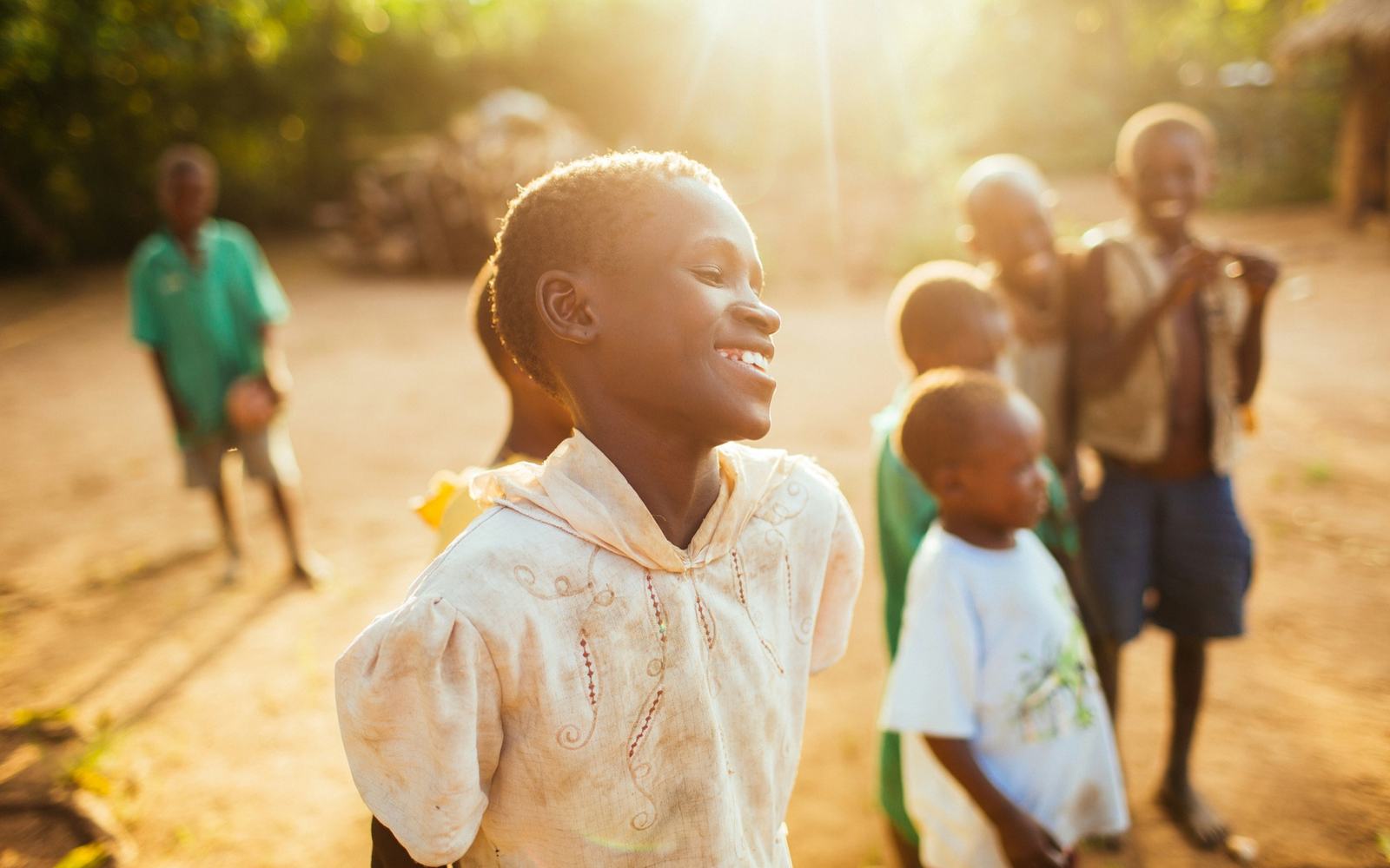 Children playing in warm evening light