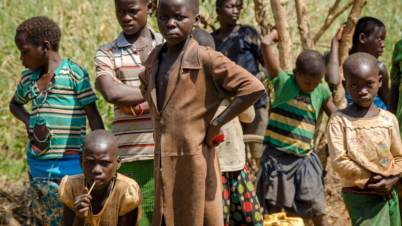 A group of children standing together outdoors
