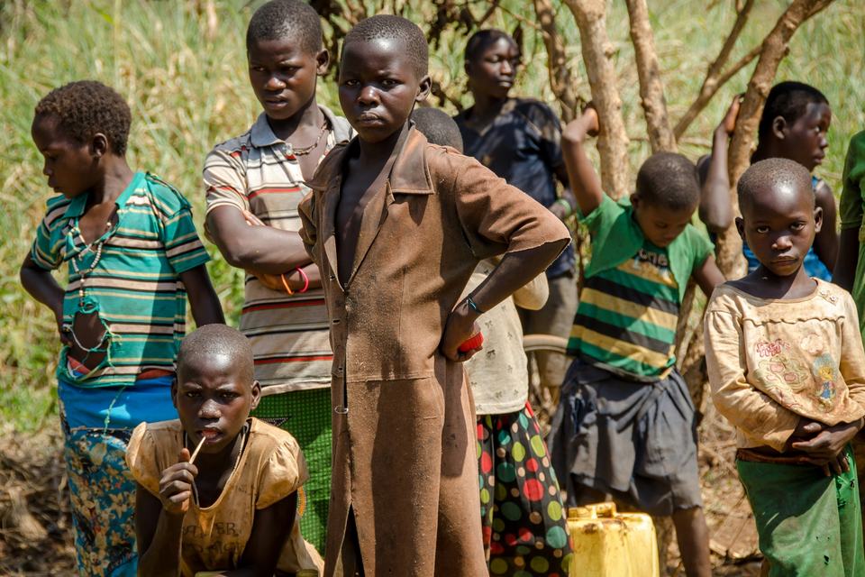A group of children standing together outdoors